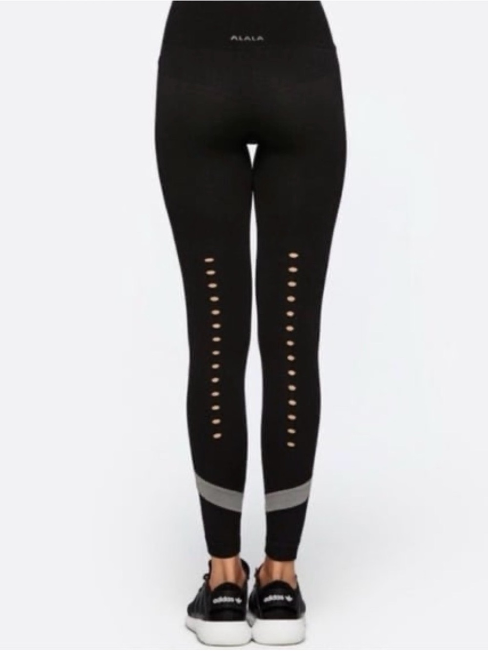 Alala Black Laser-Cut High-Waist Leggings with Reflective Stripe